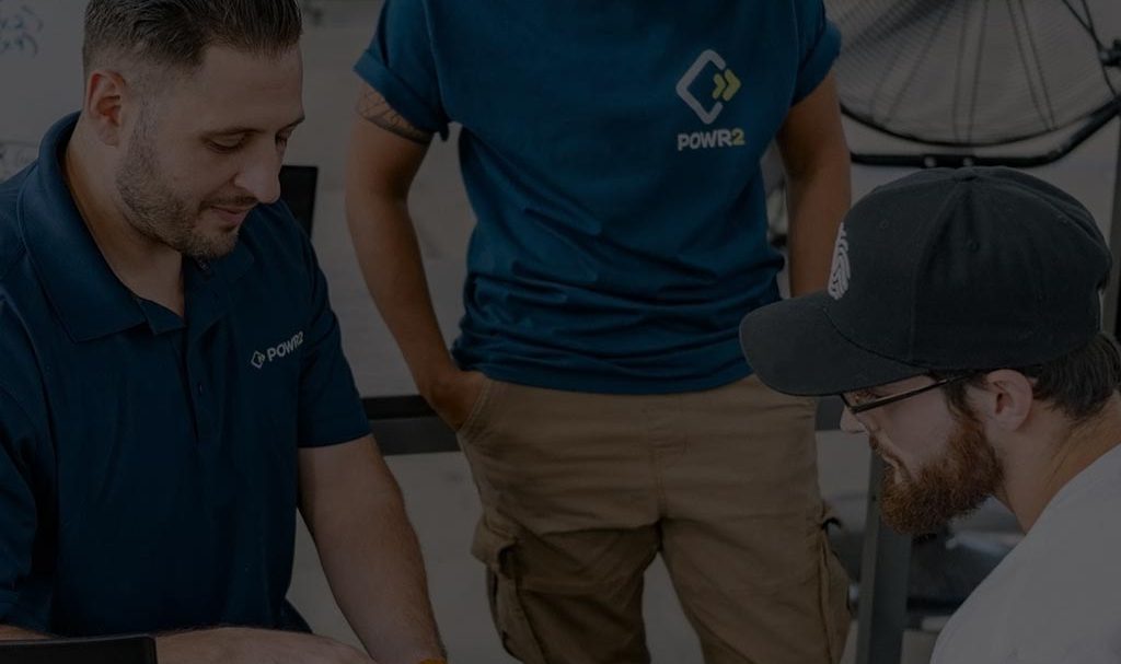 powr background image with three employees